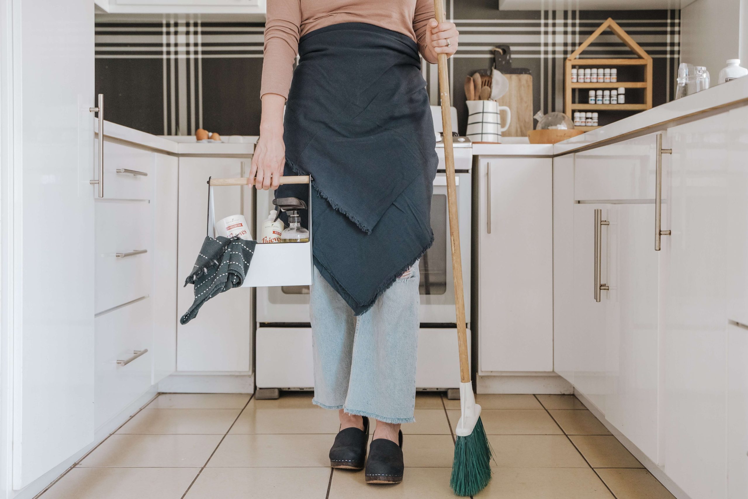 spring cleaning - woman in kitchen