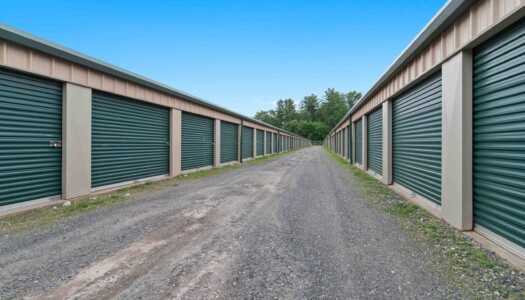 aisle of drive-up storage units at Pioneer Valley Storage in Belchertown, MA